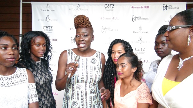 Nevis-born Emmy Award winning hair stylist Petula Skeete (middle) with five budding fashion designers from Nevis and Director of Youth Development Zahnela Claxton (extreme right) at the end of Skeete’s #beautyFULL Women’s Conference at the Four Seasons Resort on July 03, 2016